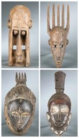 4 West African style masks. 20th century.