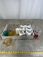 Assortment of drinking glasses, candleholders,