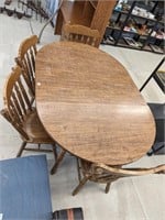 Wooden table with 4 chairs