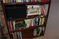 3 lower shelves of books