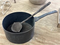 Homemade Metal Pot and Cast Iron Ladle
- pot is
