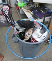 Brute Garbage Bin Filled with Sporting Goods