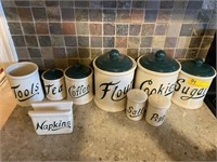 Set of 6 jars, 2 shakers, and a napkin holder