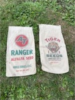 (2) old cloth seed sacks