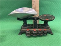 Toy cast iron scale