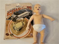 Die Cast Vintage toy in package, and Dancing baby