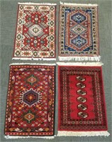 4 handmade oriental rugs - approx. 2' x 3'