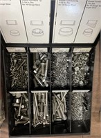 Nuts and bolts in container
