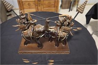 Thai wood carving of battle elephants and