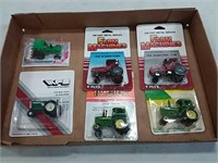 assortment of 1/64 scale tractors