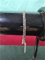 Sterling silver and black bracelet with tassle