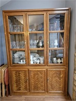 China cabinet. 56"L, 16"W, 80"H. Lighted cabinet.