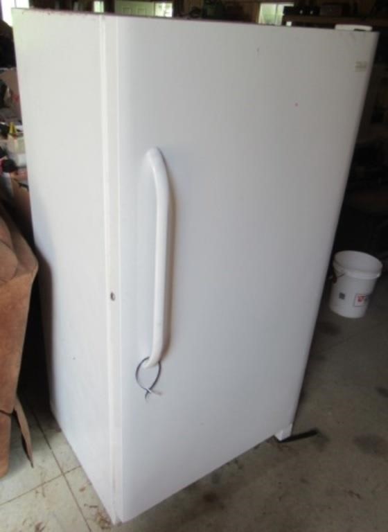 Frigidaire upright freezer. Measures: 67" H x 34"
