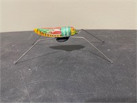 Vintage jumping grasshopper