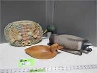Duck decoys and a wall hanging