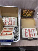 3 boxes exit signs man cave coat rack