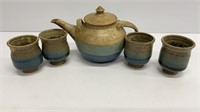 Brown, blue and green signed pottery tea pot and