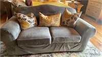 68 inch Cranberry colored sofa with gray cover
