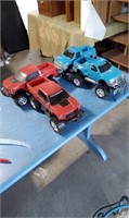 FOUR 12" LONG FORD TOY TRUCKS