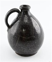 Redware pottery glaze handled jug 7”