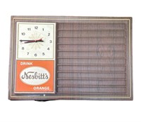 "Drink Nesbitt's Orange" menu clock