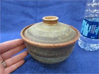 pottery jar with lid
