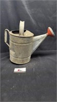 Galvanized watering can