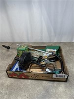 Gardening hand tools, gloves, plant food and