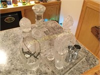 booze decanters jiggers on tray glasses