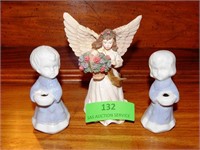 Angel baby with broken leg, two doves two small