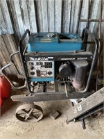 Makita generator G5501R on meal wheeled cart
