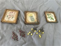 Antique earrings and floral drawings in frame 11B
