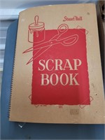 Vintage scrapbook with newspaper clippings,
