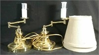 Set of two gold swing arm lamps