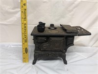 Mini cast-iron recent stove with two pots