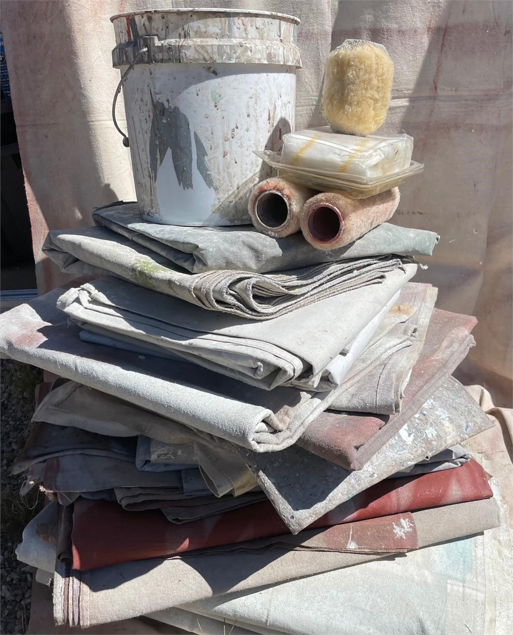 Various used tarps & canvases