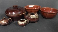 Lot of brown glazed ceramic and pottery items.