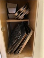 Contents of Kitchen Cabinet- Cookie Sheets, Baking