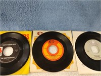 3 45 rpm Records in Cover