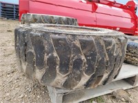 (1) Tire 10x16.5 on 8 Bolt Skidloader Rim