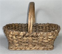 Uncommon wooden plank bottom market basket ca.