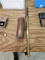 Antique brass telescope with leather holder