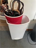 Trashcan and large amount of belts