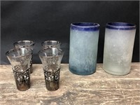 4 shot glasses and 2 frosted blown glasses