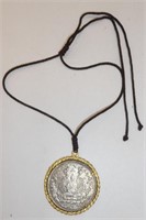 THOUSAND HANDS CANNON COIN NECKLACE
