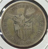 Silver 1907 USA dollar coin One peso Filipinos