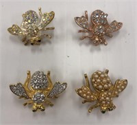 Four Insect Pendants
