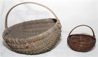 (2) oak splint baskets; small 9" diam & has a few