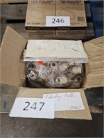 box of plumbing parts