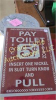 Pay toilet sign